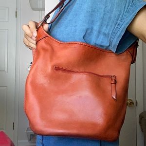 beautiful burnt orange coach purse